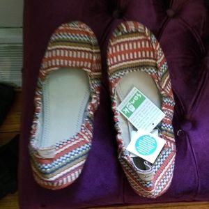 Sanuk slip ons